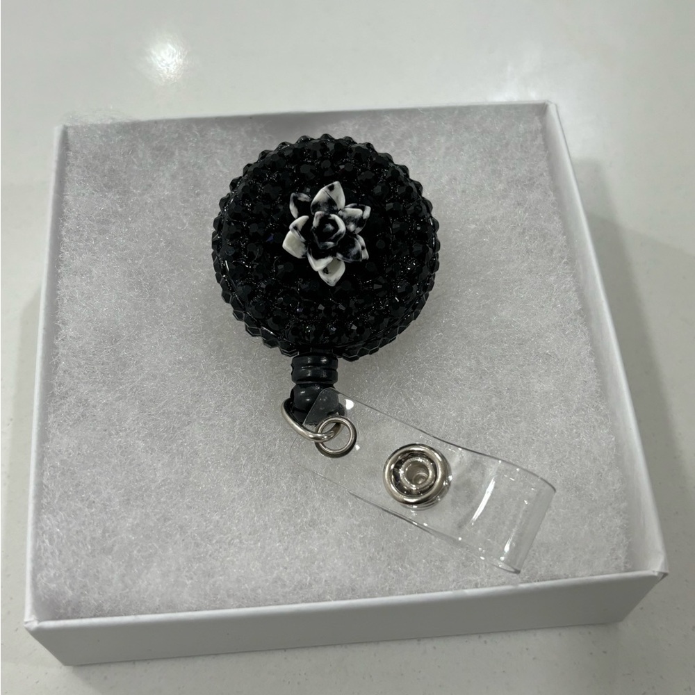 Say goodbye to dull and hello to dazzling with our Custom Bling Badge Reels!
